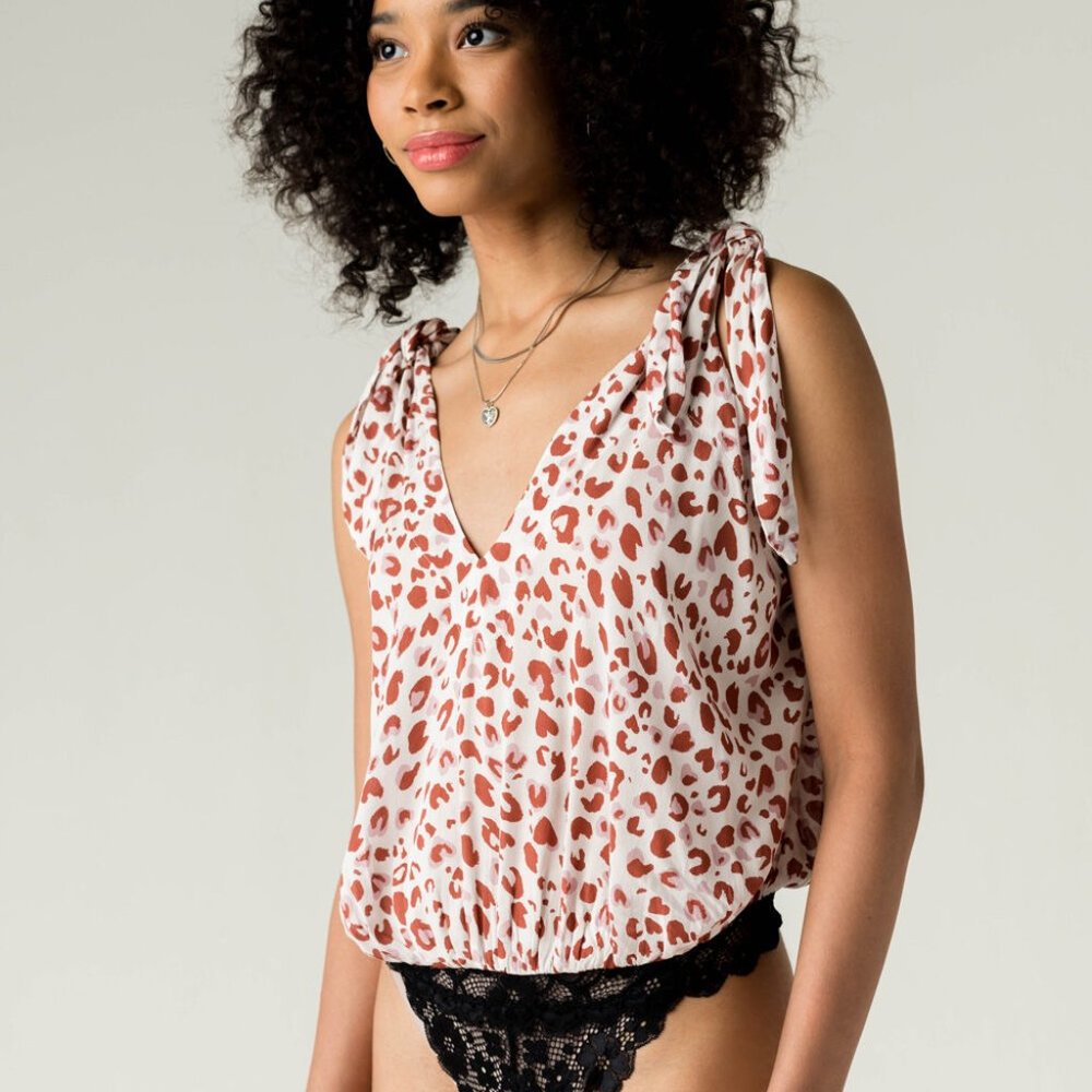 NWOT | Free People | Bare it All Bodysuit in Leopard (S)